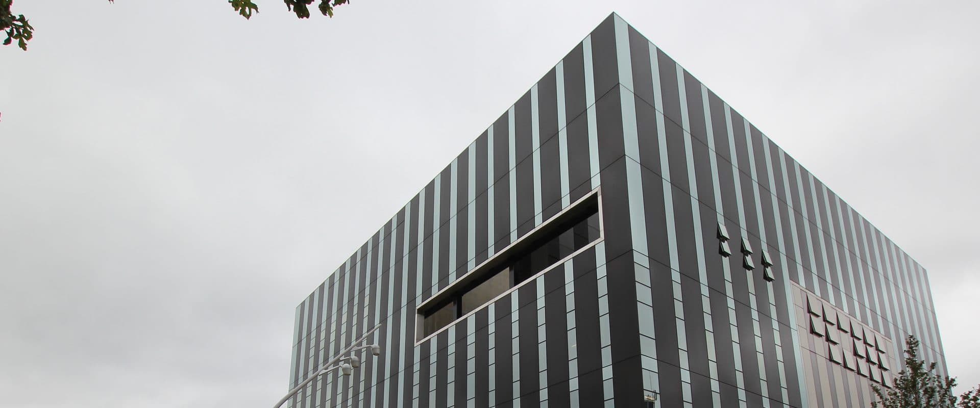 The Corby Cube, the modern civic building housing the council chamber, library, and theatre