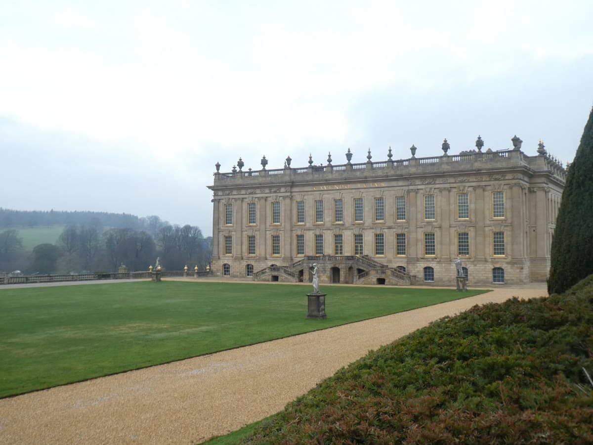 The south facade of Chatsworth House across its lawn