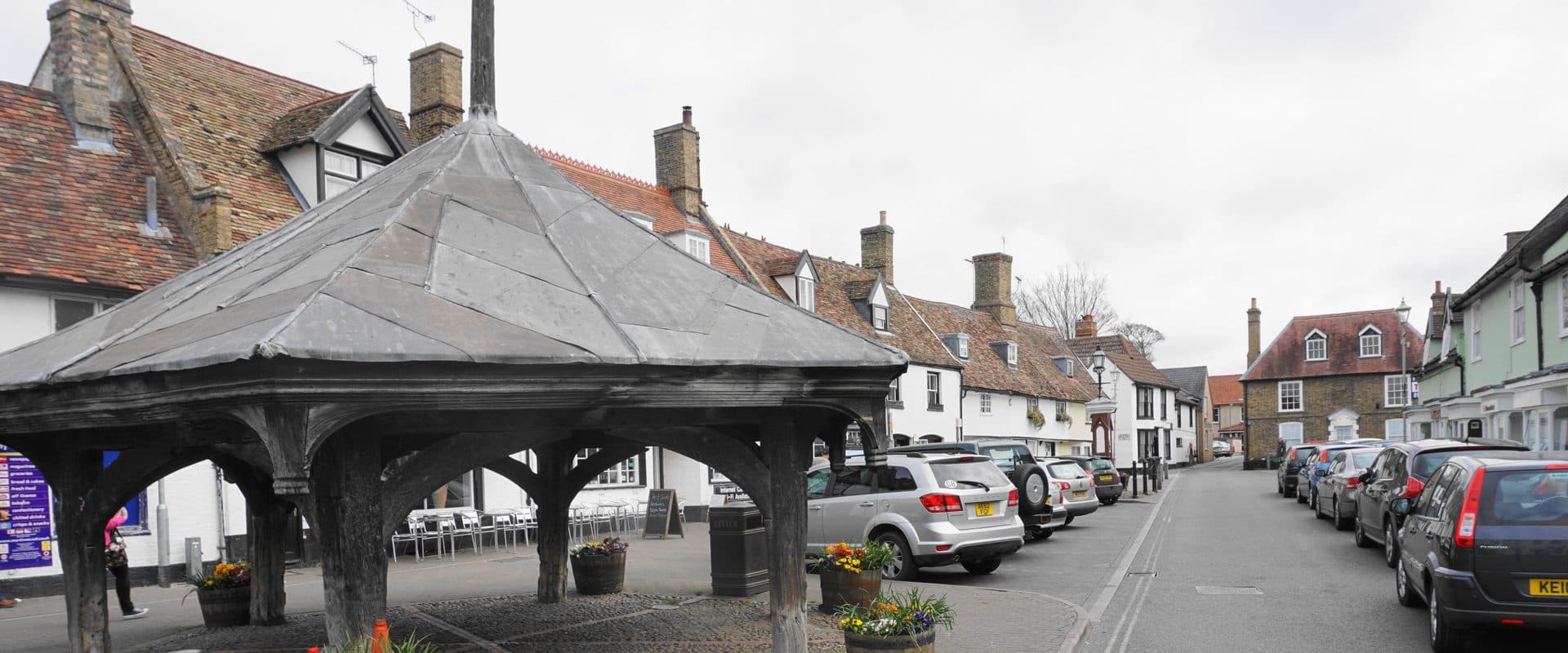 Mildenhall's Market Place with its shops and the historic market cross at the town centre